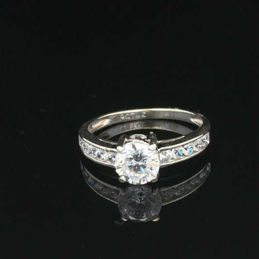 9ct white gold ring in size L 1/2, weighing 2g, featuring a sleek, polished finish. Unbranded jewelry ring displayed.