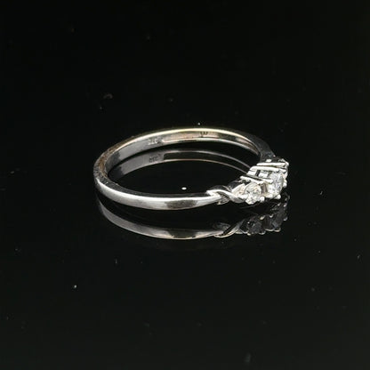 9ct white gold diamond ring in size Q1/2 with sparkling diamonds, elegant jewelry piece with a polished finish.
