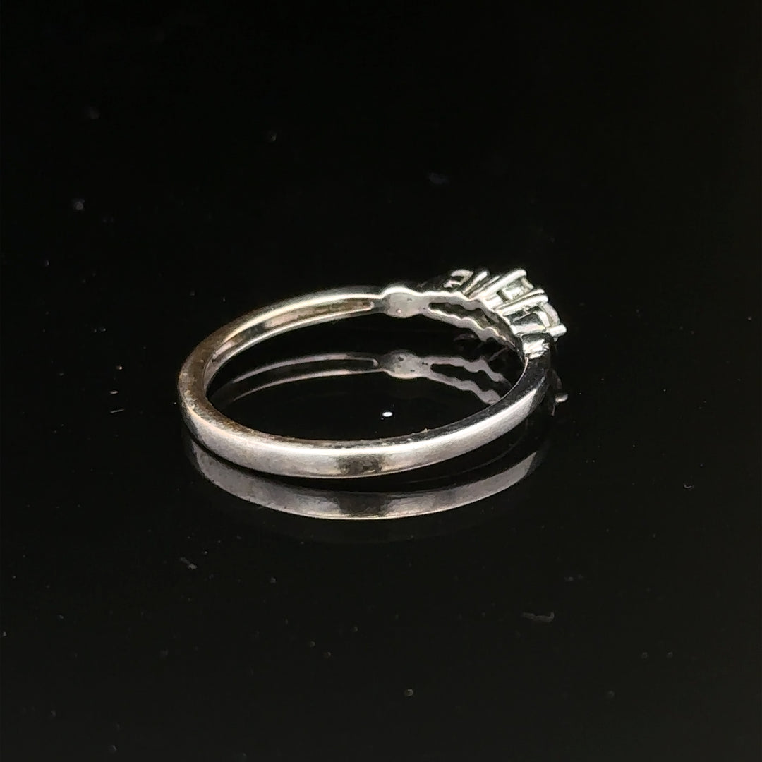 9ct white gold diamond ring size Q1/2 with sparkling diamonds, elegant jewelry piece showcasing fine craftsmanship.