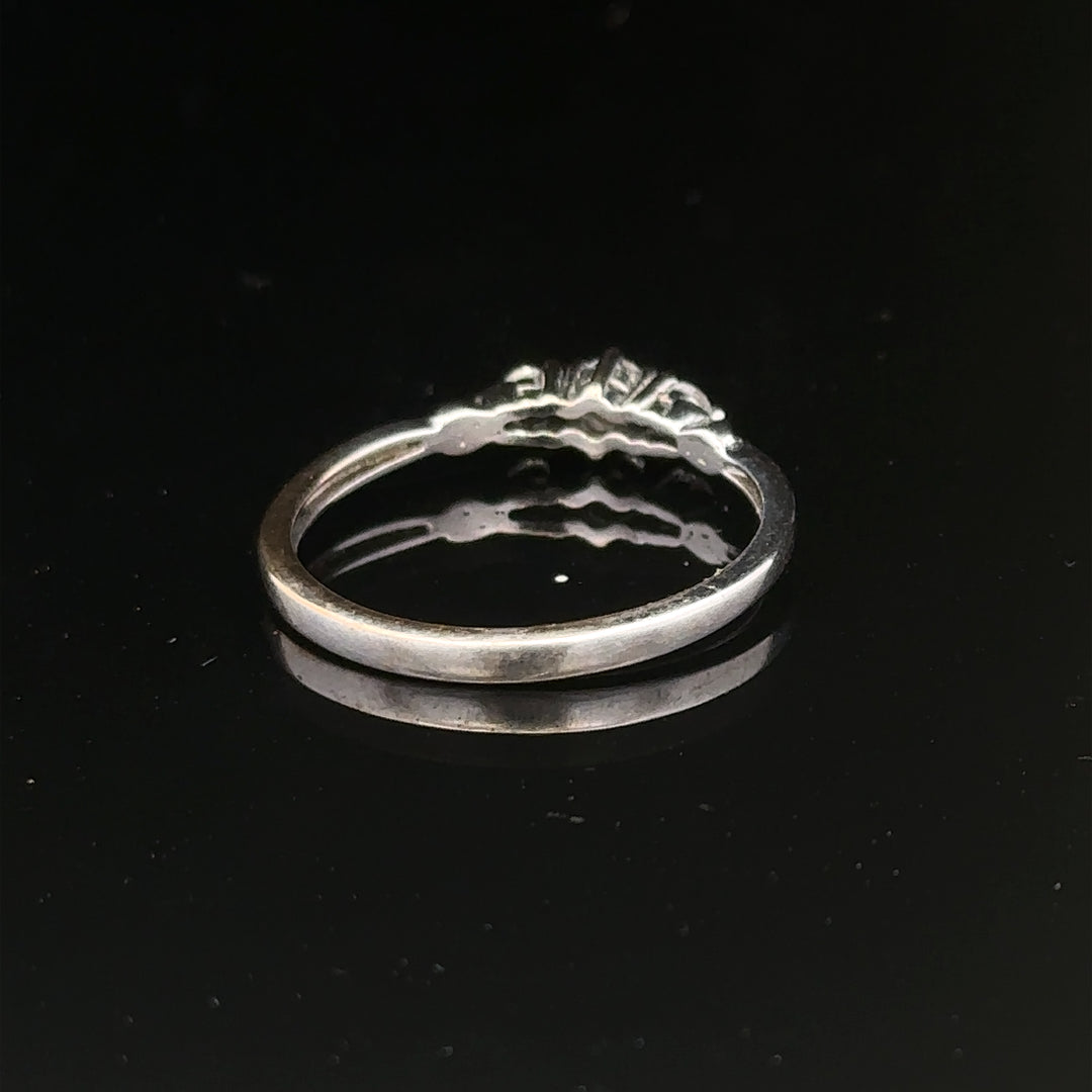 9ct white gold diamond ring size Q 1/2 with sparkling diamonds, elegant jewelry piece, unbranded.