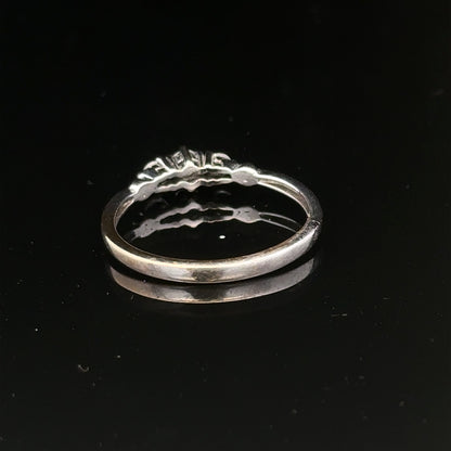 9ct white gold diamond ring in size Q1/2 with sparkling diamonds, showcasing elegant jewelry craftsmanship.