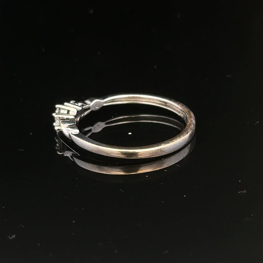 9ct white gold diamond ring size Q1/2 with sparkling diamonds, showcasing elegant jewelry design and craftsmanship.