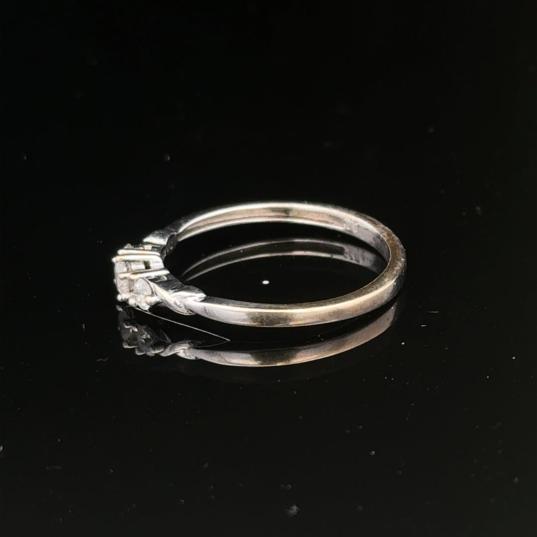 9ct white gold diamond ring size Q1/2 featuring a sparkling diamond setting on a sleek band.