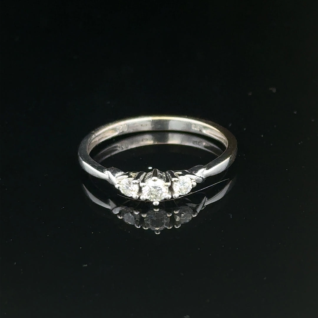 9ct white gold diamond ring size Q1/2 with sparkling diamonds, elegant jewelry piece showcasing fine craftsmanship.