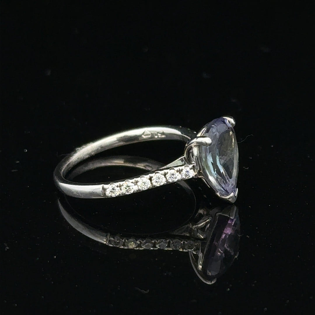 18ct white gold diamond ring in size L1/2 with sparkling diamonds, elegant jewelry piece featuring a delicate band.