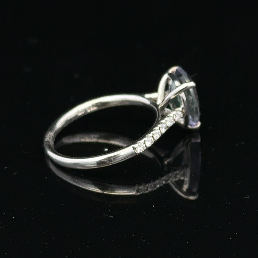 18ct white gold diamond ring size L1/2 with sparkling diamonds, showcasing elegant jewelry design and craftsmanship.