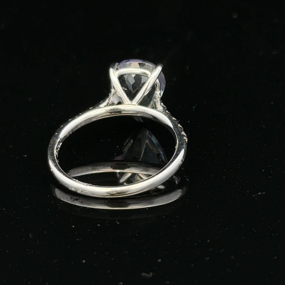 18ct white gold diamond ring in size L1/2 with sparkling diamonds and a sleek band design.