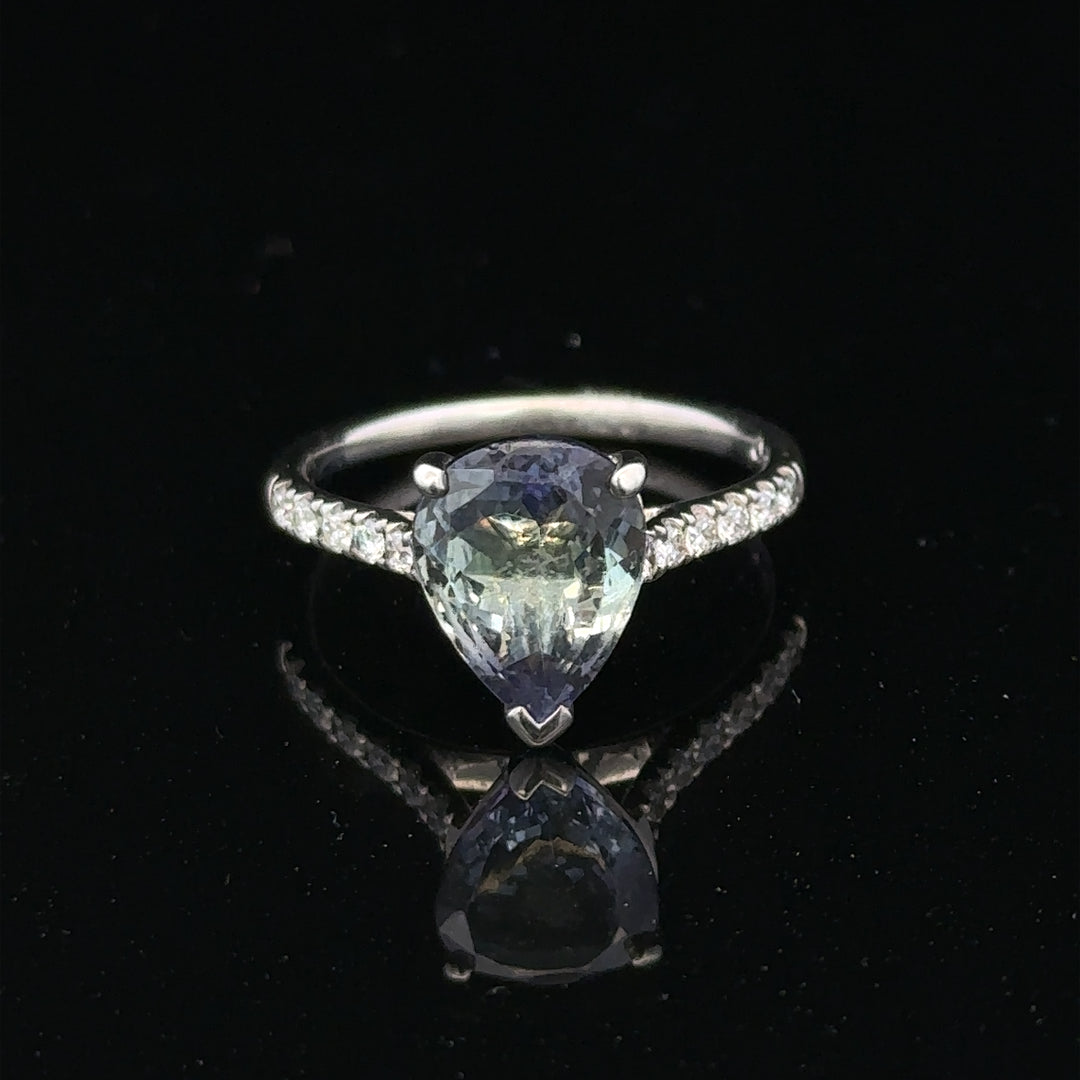 18ct white gold diamond ring in size L1/2 with sparkling diamonds, showcasing elegant jewelry design.