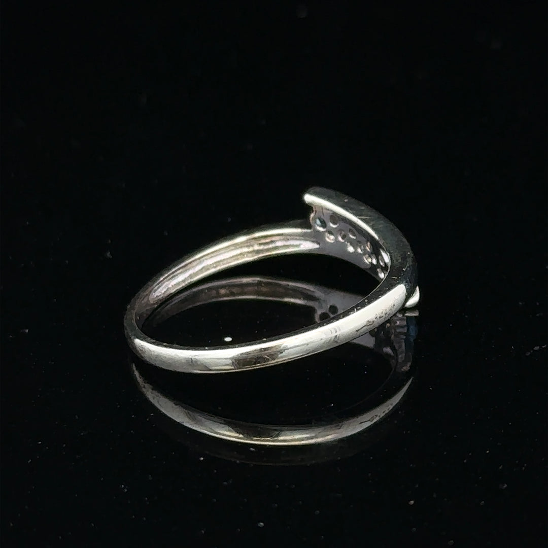 9ct white gold diamond ring size N1/2 with sparkling diamonds, showcasing elegant jewelry design.