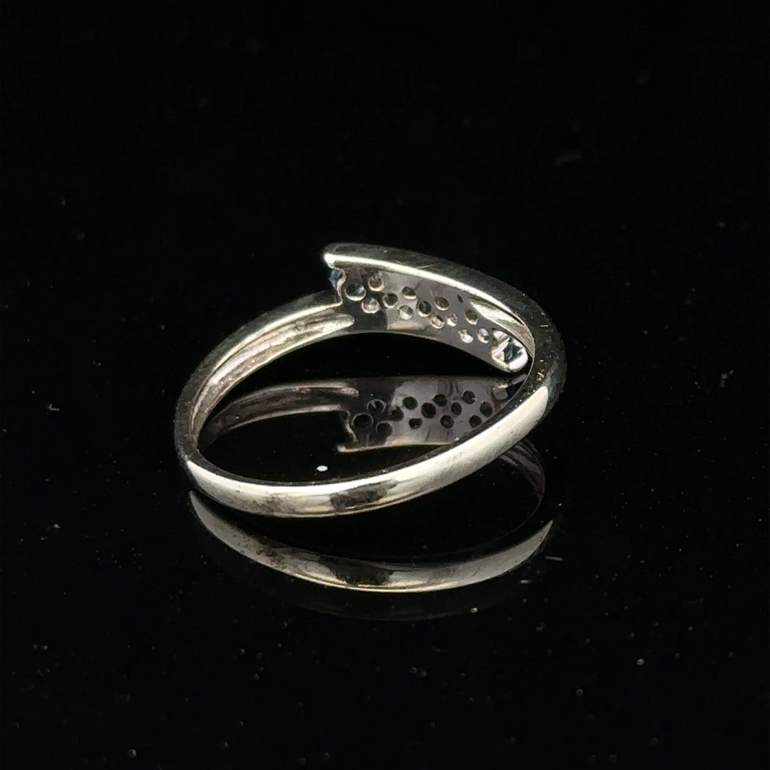 9ct white gold diamond ring size N1/2 with sparkling diamonds, showcasing elegant craftsmanship and a sleek design.