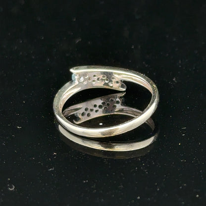 9ct white gold diamond ring size N1/2 with sparkling diamonds, showcasing elegant jewelry design.