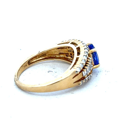 18ct yellow gold diamond and tanzanite ring size N1/2 with sparkling gemstones and elegant band design
