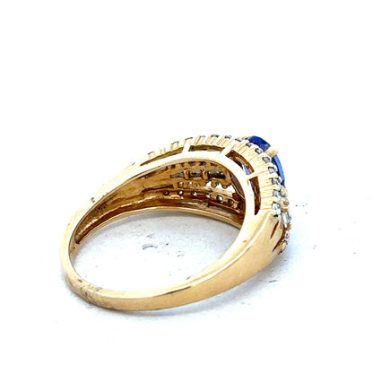 18ct yellow gold diamond and tanzanite ring, size N1/2, showcasing sparkling gemstones and elegant gold band.