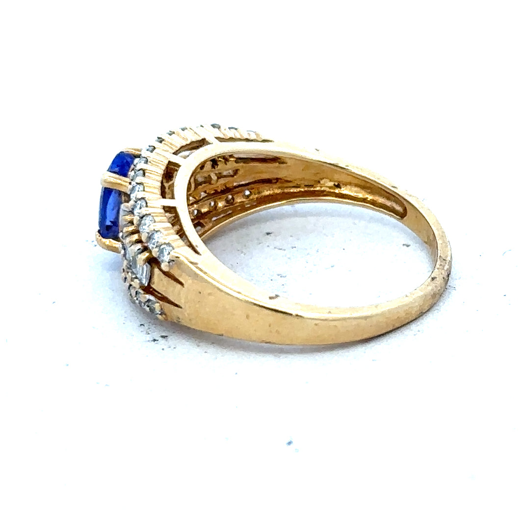 18ct yellow gold diamond and tanzanite ring, size N1/2, showcasing sparkling gemstones and elegant gold band.