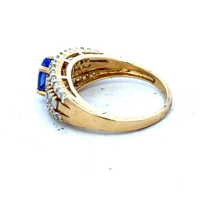 18ct yellow gold diamond and tanzanite ring, size N1/2, showcasing sparkling gemstones and elegant gold band.