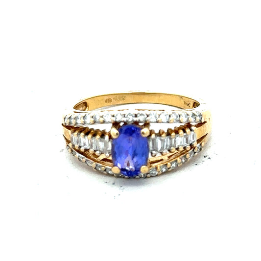 18ct yellow gold diamond and tanzanite ring, size N1/2, showcasing a sparkling gemstone design.