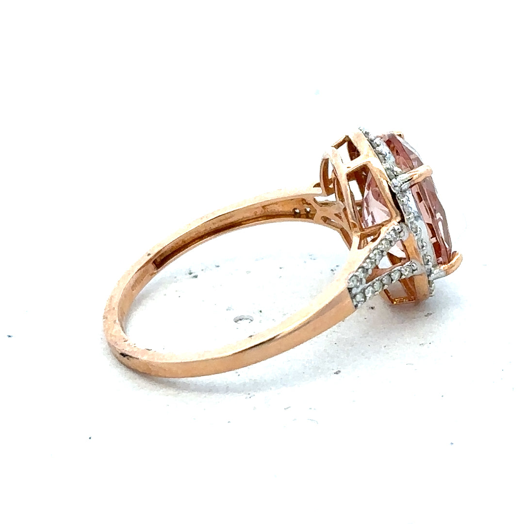 14ct gold ring with morgantite and diamond accents, size S, unbranded jewelry piece featuring elegant gemstone details.