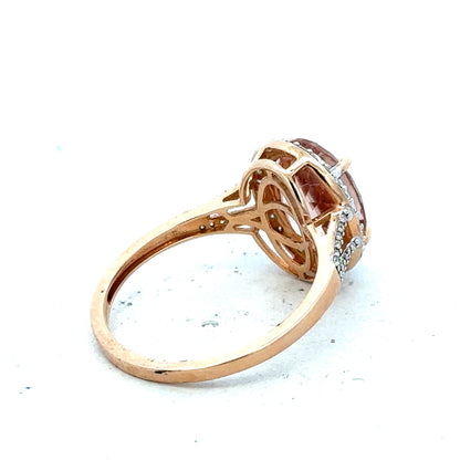 14ct gold Morganite and diamond ring in size S, featuring a sparkling gemstone and elegant design.
