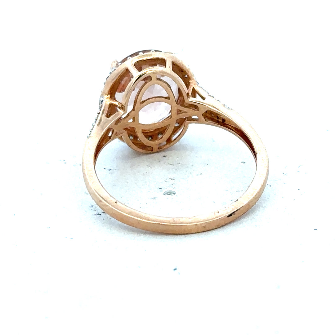 14ct gold Morganite and diamond ring in size S, featuring a elegant design with sparkling gemstones on a polished gold band