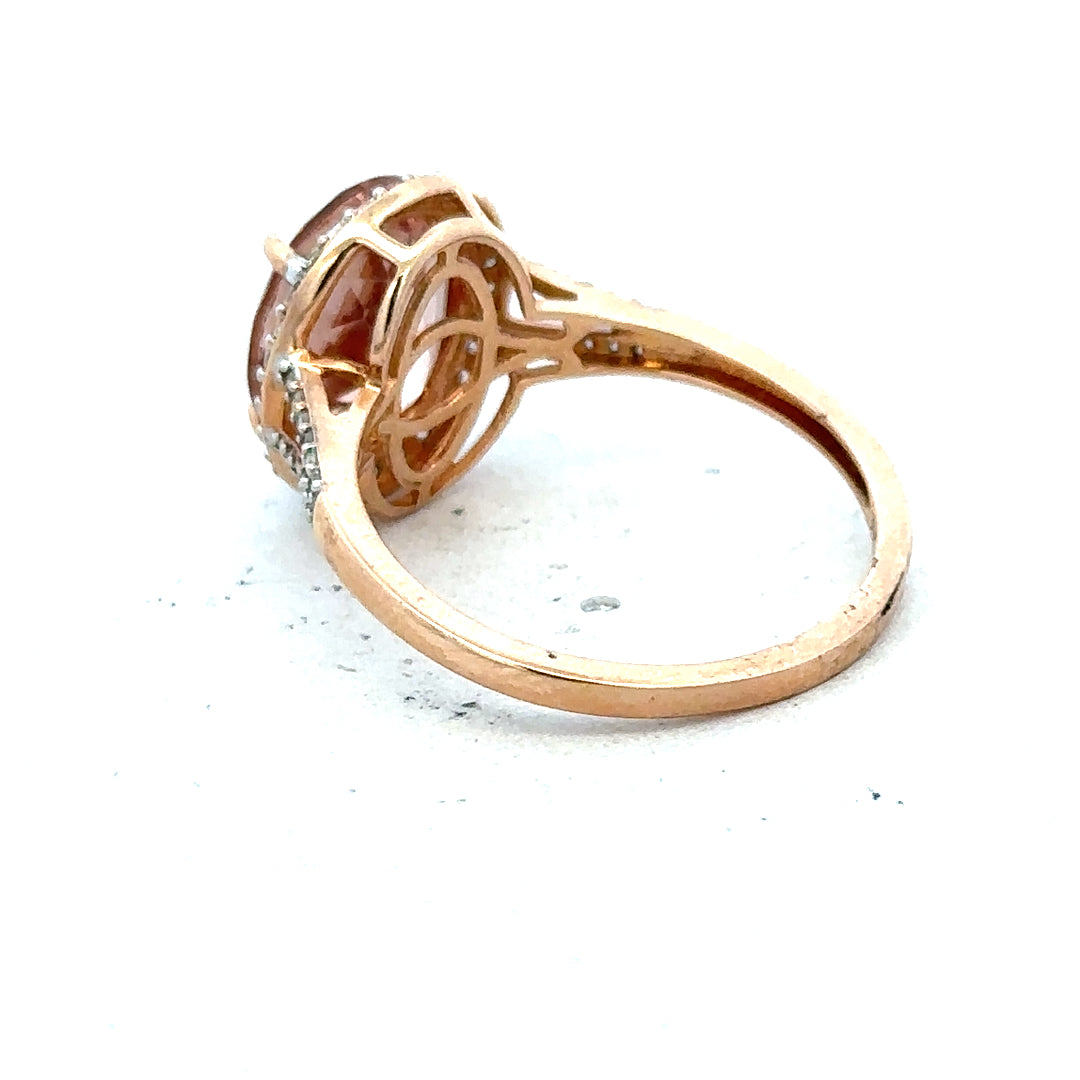 14ct gold Morganite and diamond ring in size S, featuring a sparkling gemstone and elegant design.