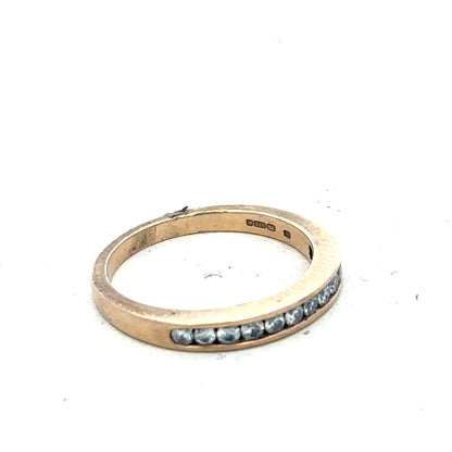 9ct yellow gold diamond ring with 1/4 carat total weight, size J1/2, featuring a sleek and elegant design.