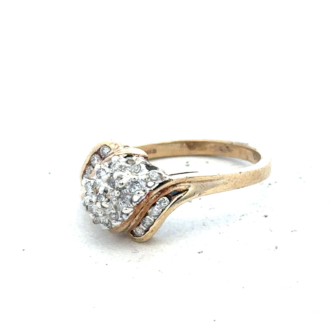 9ct yellow gold diamond ring with 0.26 carats of diamonds, size P, unbranded jewelry image showing detailed design and sparkle.