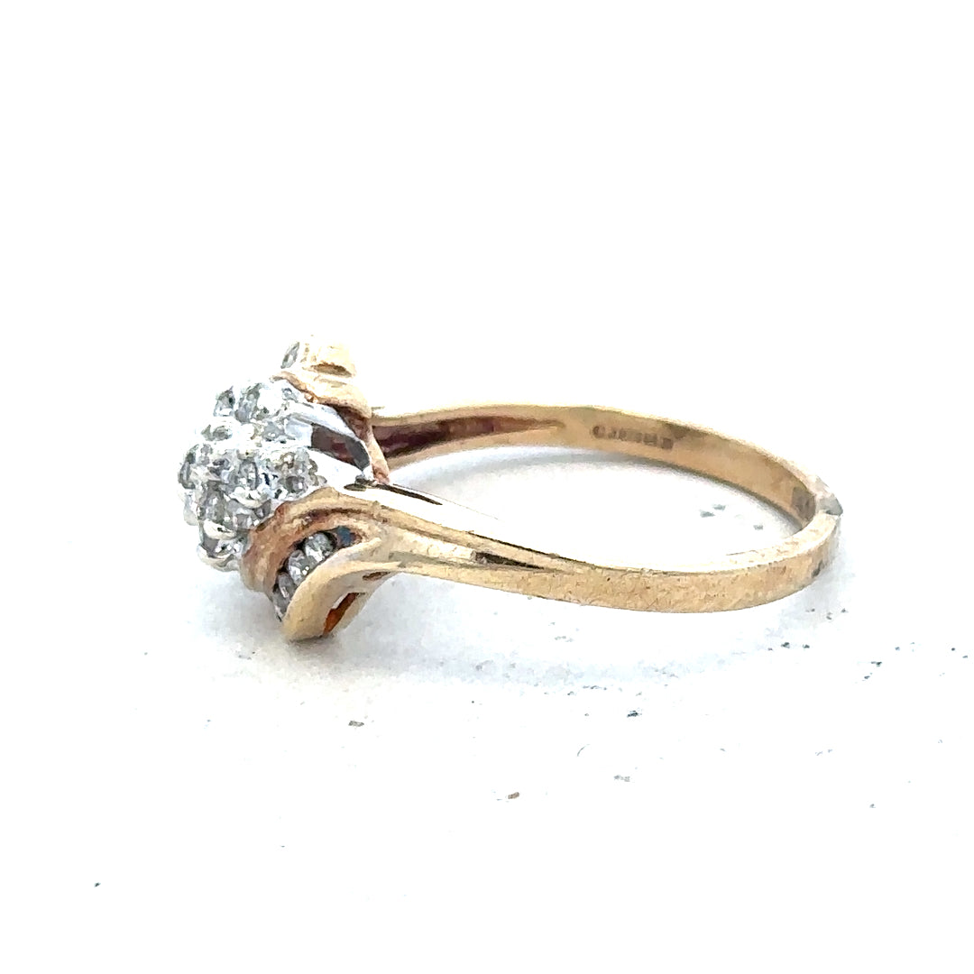 9ct yellow gold diamond ring with 0.26 carats, size P, featuring a sparkling center stone and delicate band design.