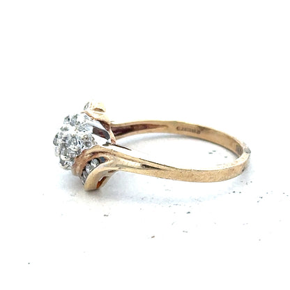 9ct yellow gold diamond ring with 0.26 carats, size P, featuring a sparkling center stone and delicate band design.