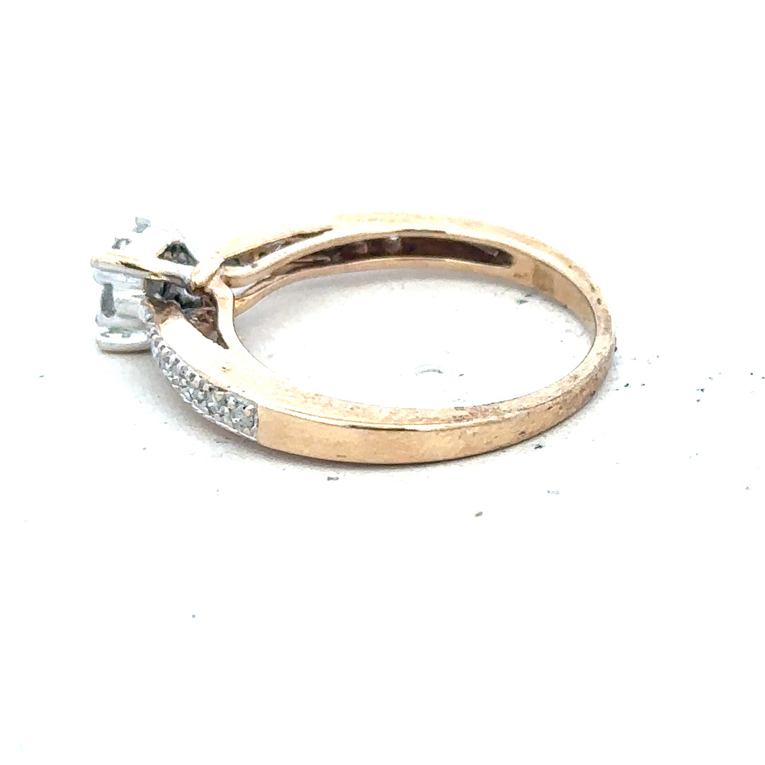 9ct yellow gold diamond ring in size P, featuring a delicate band with sparkling diamonds, unbranded jewelry accessory.