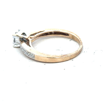 9ct yellow gold diamond ring in size P, featuring a delicate band with sparkling diamonds, unbranded jewelry accessory.