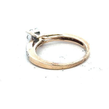 9ct yellow gold diamond ring size P with sparkling gemstones, showcasing elegant craftsmanship and a polished finish.