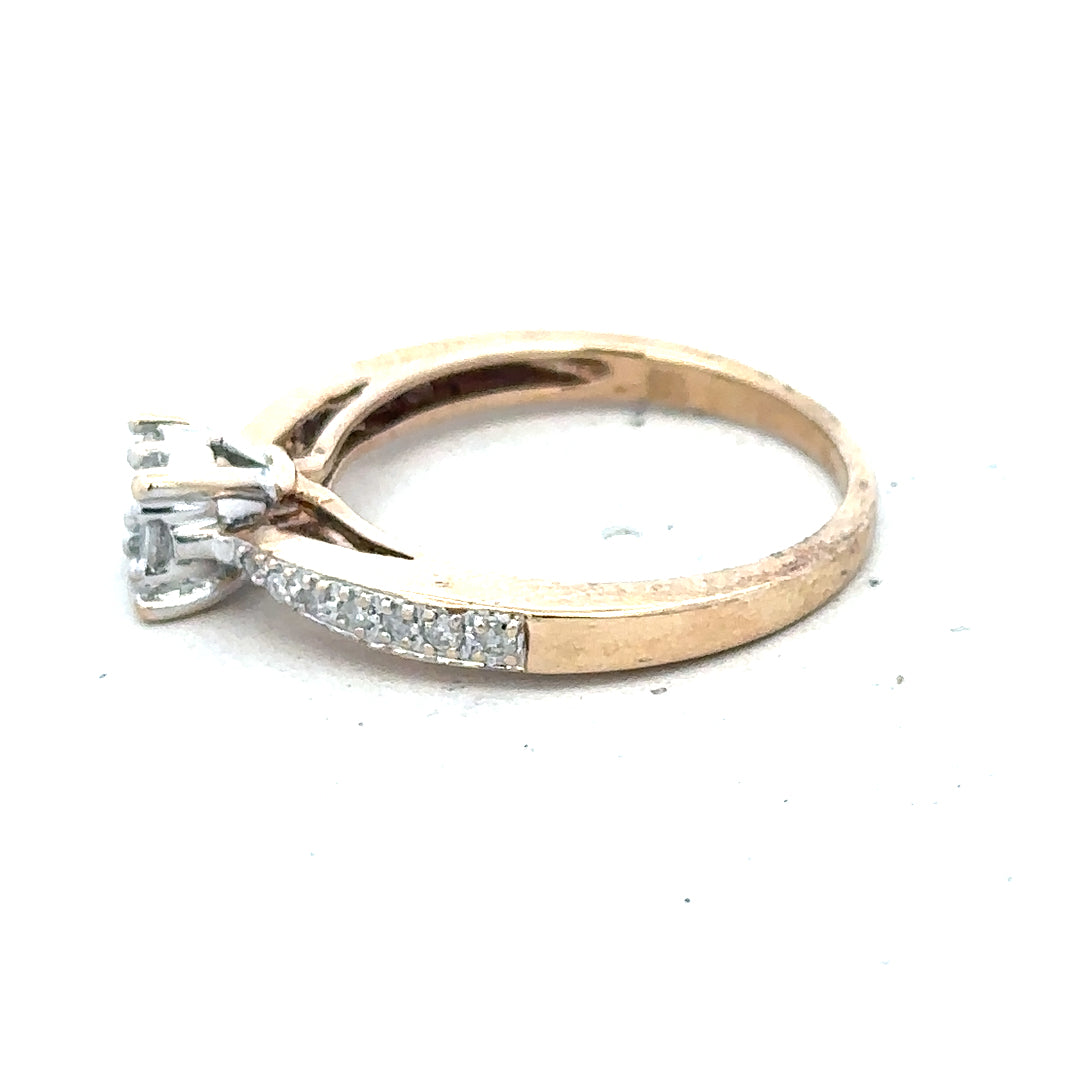 9ct yellow gold diamond ring size P with sparkling stones, showcasing an elegant unbranded jewelry design.