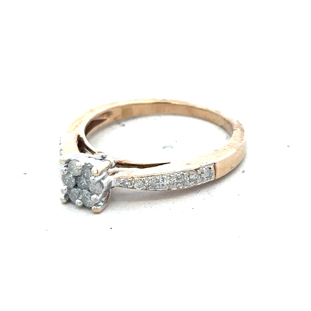 9ct yellow gold diamond ring in size P with sparkling diamonds, showcasing elegant jewelry design.