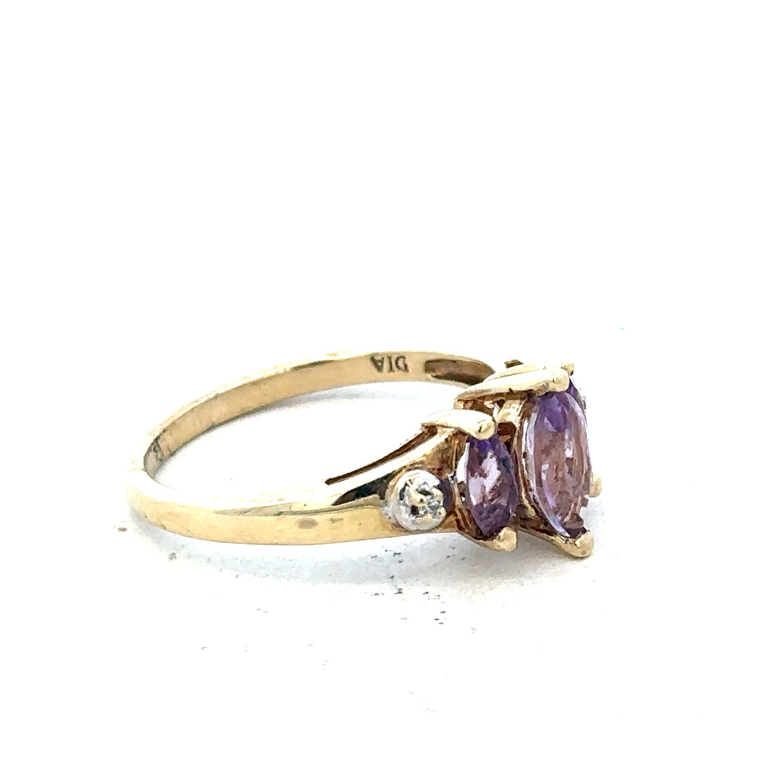 9ct yellow gold ring with a central amethyst gemstone and diamond accents, size P, unbranded jewelry.