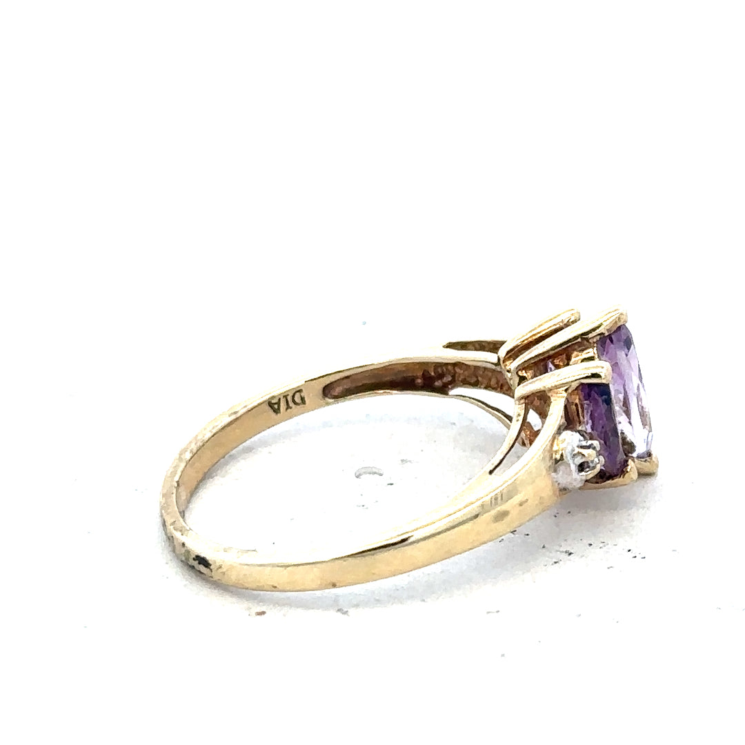 9ct yellow gold amethyst and diamond ring with a large central gemstone and diamond accents, size P, unbranded jewelry.