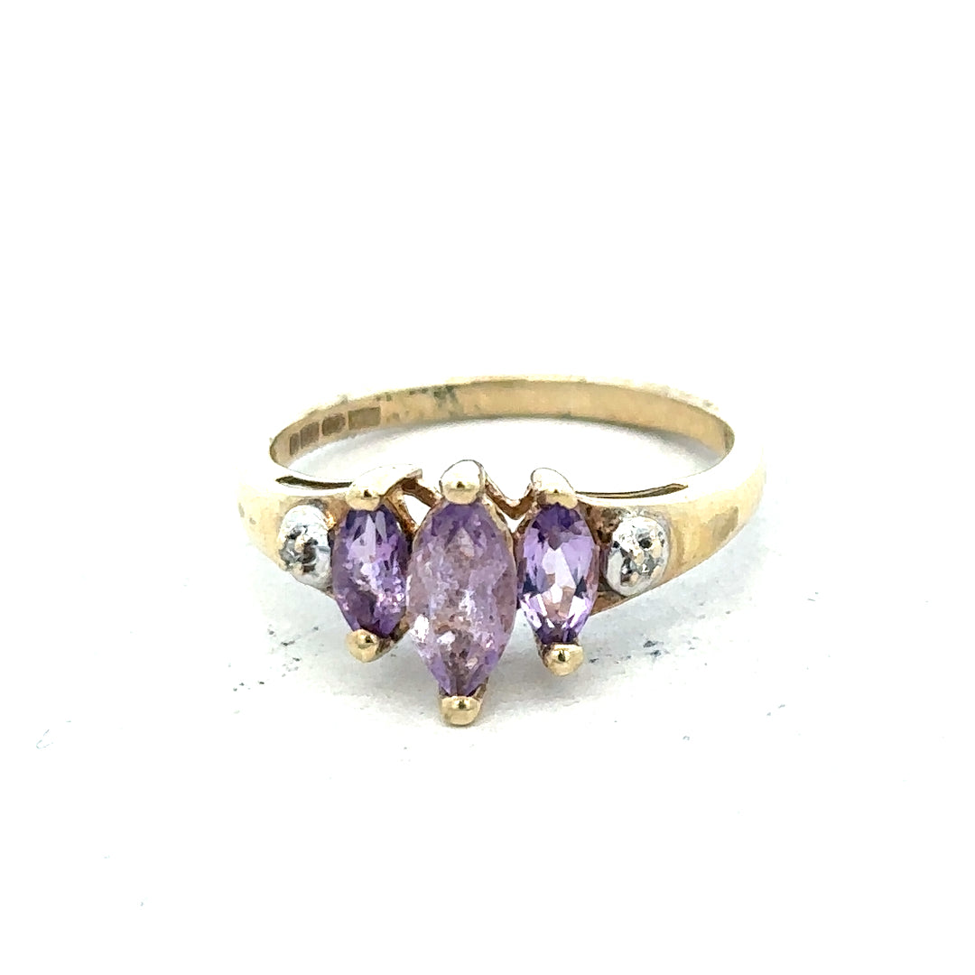 9ct yellow gold amethyst and diamond ring, size P, featuring a vibrant purple gemstone with sparkling accents.