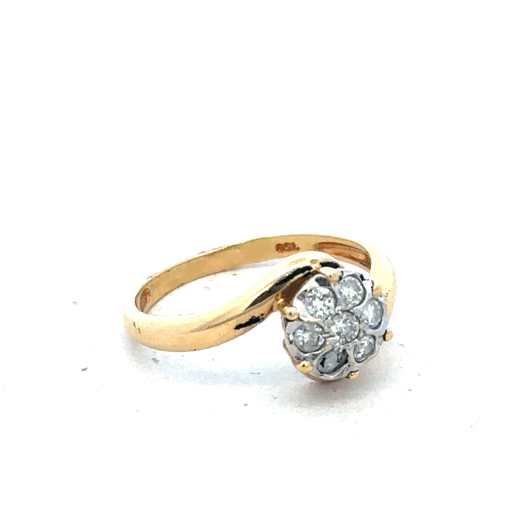 18ct yellow gold diamond ring, size L 1/2, featuring sparkling diamonds and a sleek design.