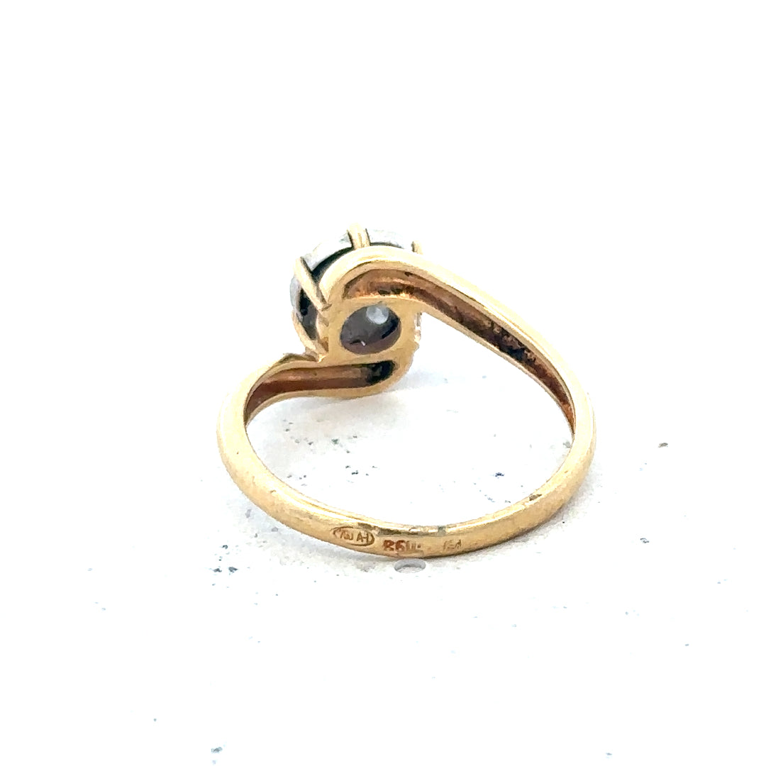 18ct yellow gold diamond ring, size L1/2, showcasing sparkling diamonds and elegant design.