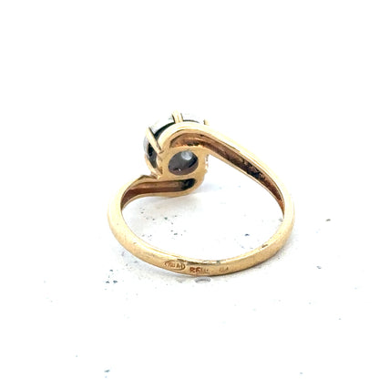 18ct yellow gold diamond ring, size L1/2, showcasing sparkling diamonds and elegant design.