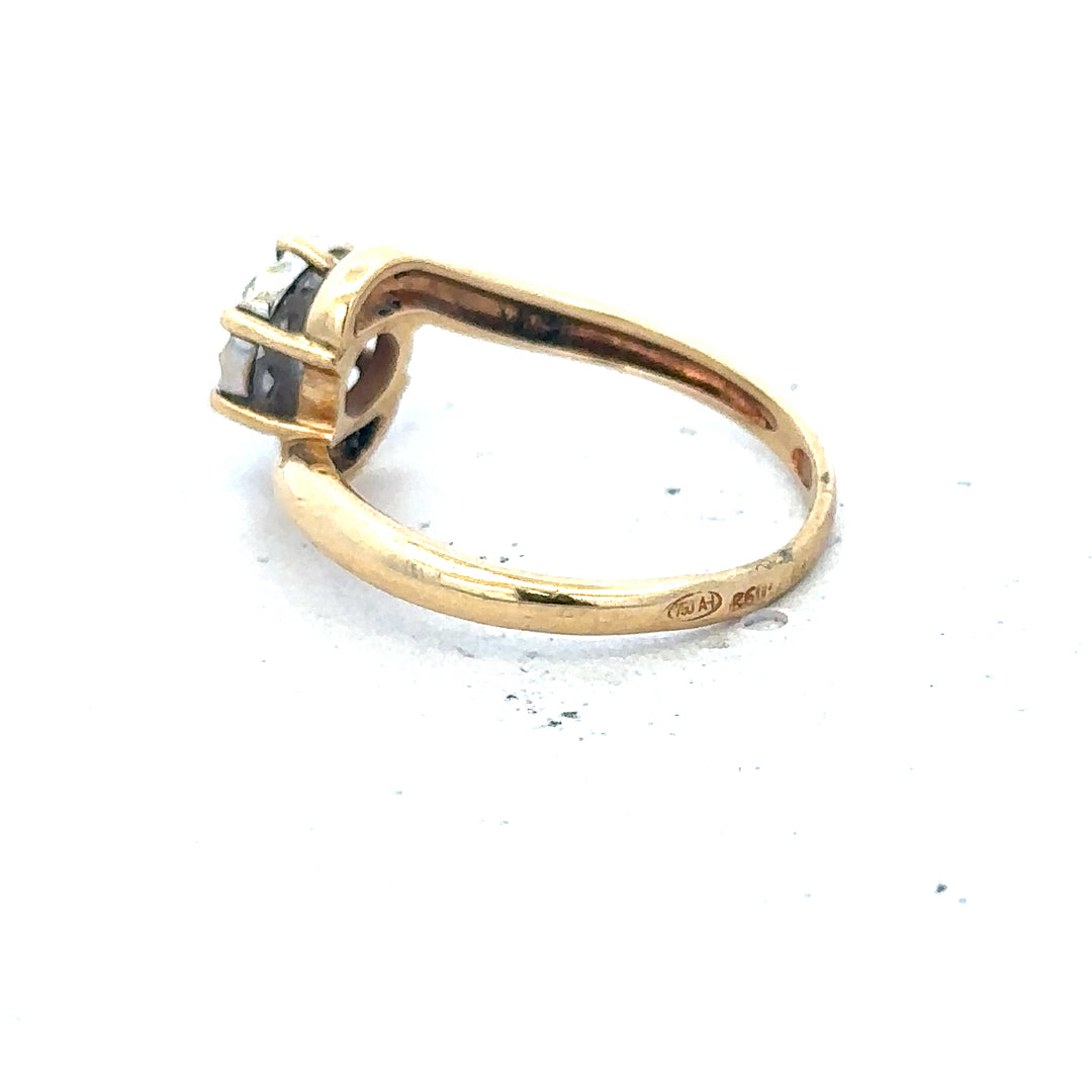 18ct yellow gold diamond ring with delicate design in size L1/2, featuring sparkling diamonds on a classic band.