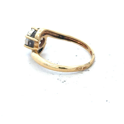 18ct yellow gold diamond ring with delicate design in size L1/2, featuring sparkling diamonds on a classic band.