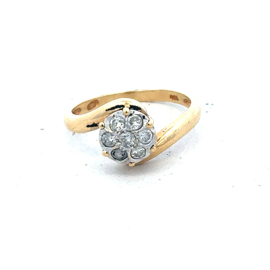 18ct yellow gold diamond ring in size L1/2, featuring a sparkling diamond centerpiece and elegant design.