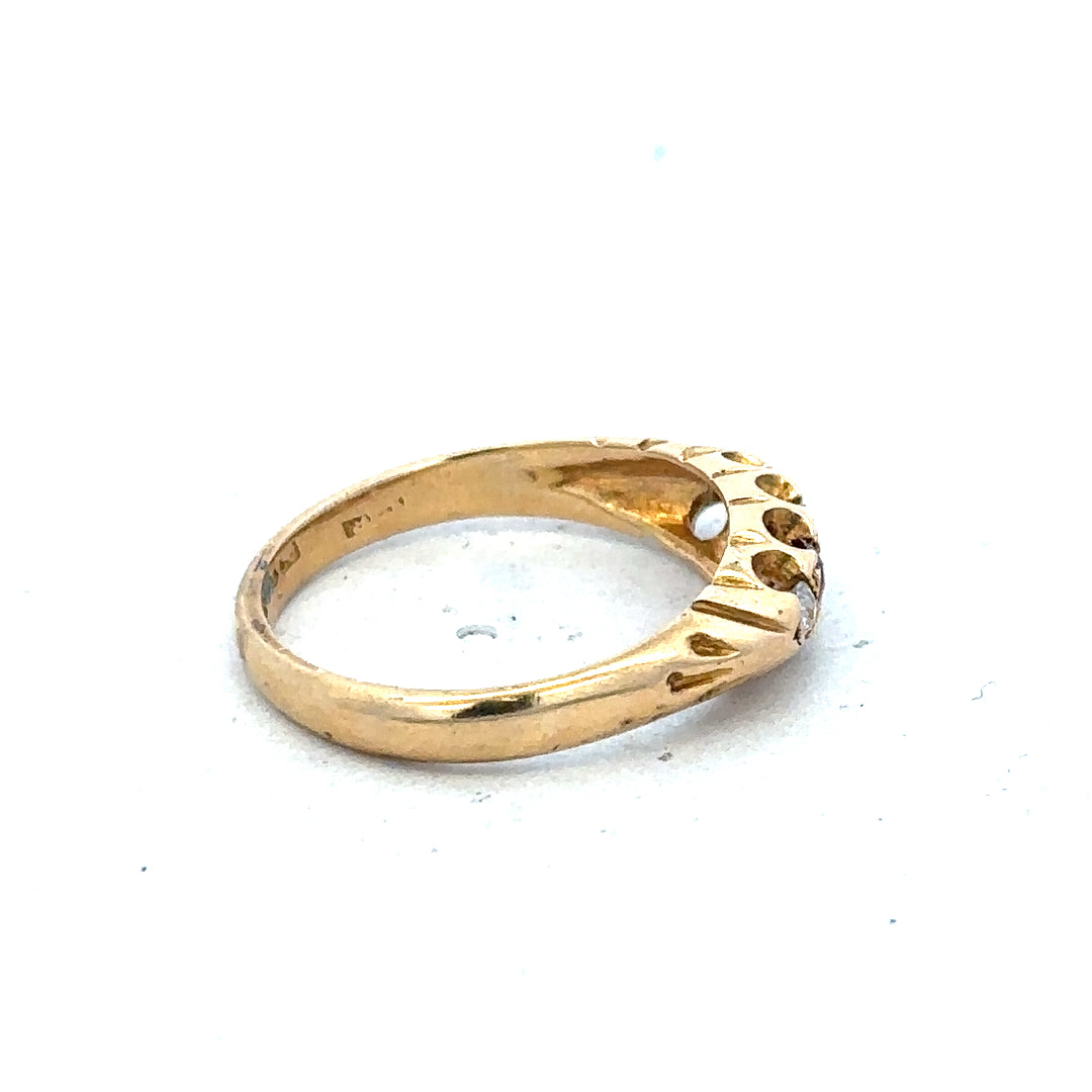 18ct yellow gold diamond and ruby ring, size N, featuring a detailed design with sparkling diamonds and vibrant rubies.