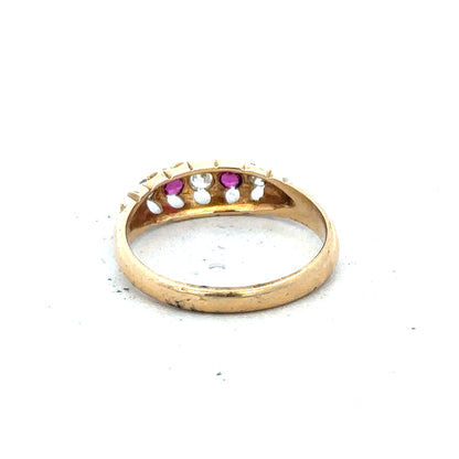 18ct yellow gold diamond and ruby ring with intricate design, size N, unbranded jewelry, shown close-up.