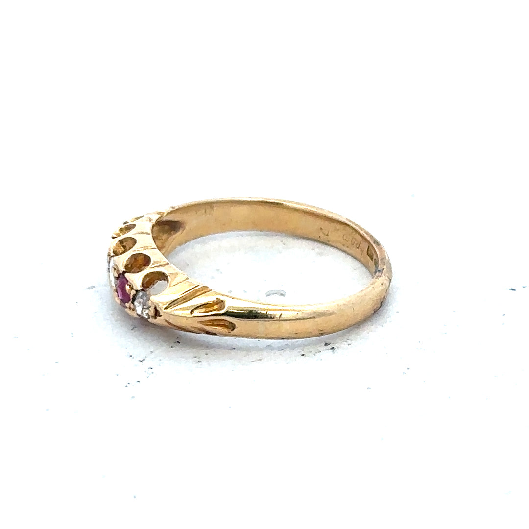 18ct yellow gold ring with diamonds and rubies, size N, featuring intricate design and sparkling gemstones.