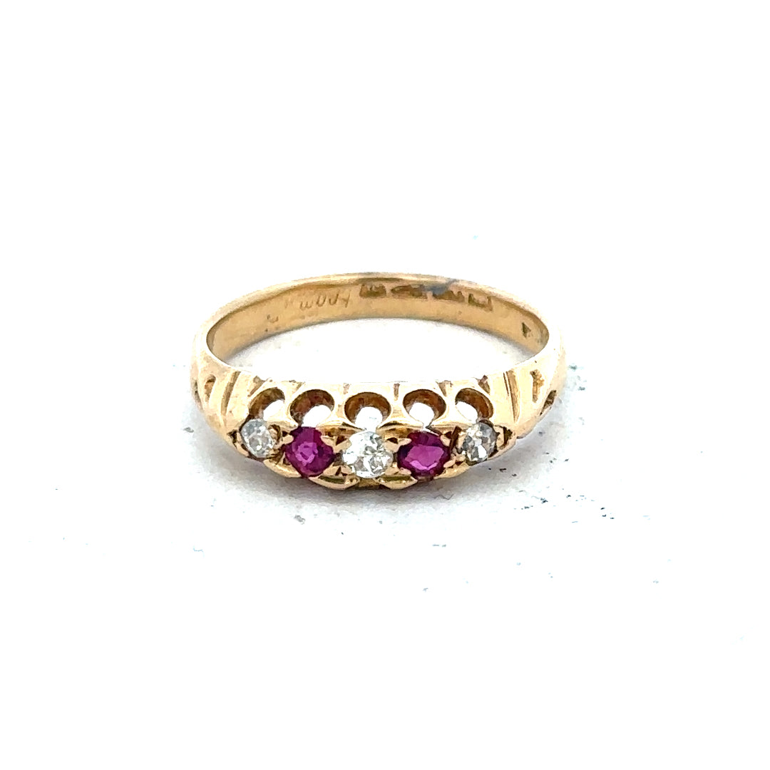18ct yellow gold ring with diamonds and rubies, size N, featuring a detailed design and sparkling gemstones.