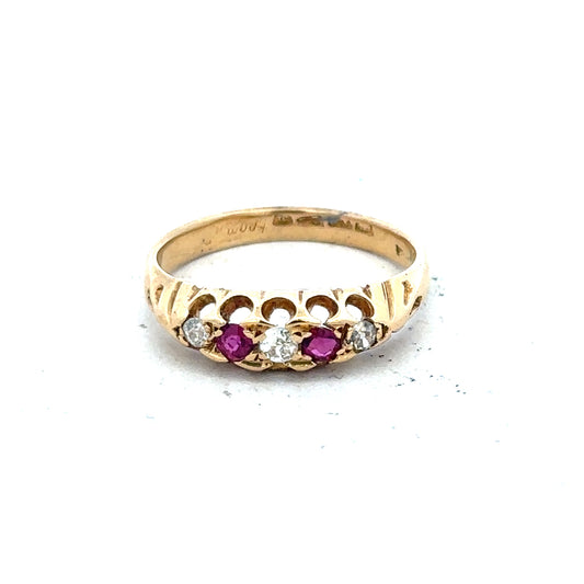 18ct yellow gold ring with diamonds and rubies, size N, featuring a detailed design and sparkling gemstones.