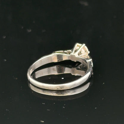 9ct white gold diamond ring with sparkling diamonds, showcasing elegant design and craftsmanship.