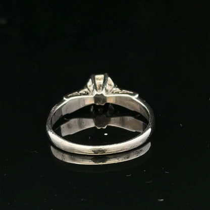 9ct white gold diamond ring with sparkling diamonds, showcasing elegant design and craftsmanship.