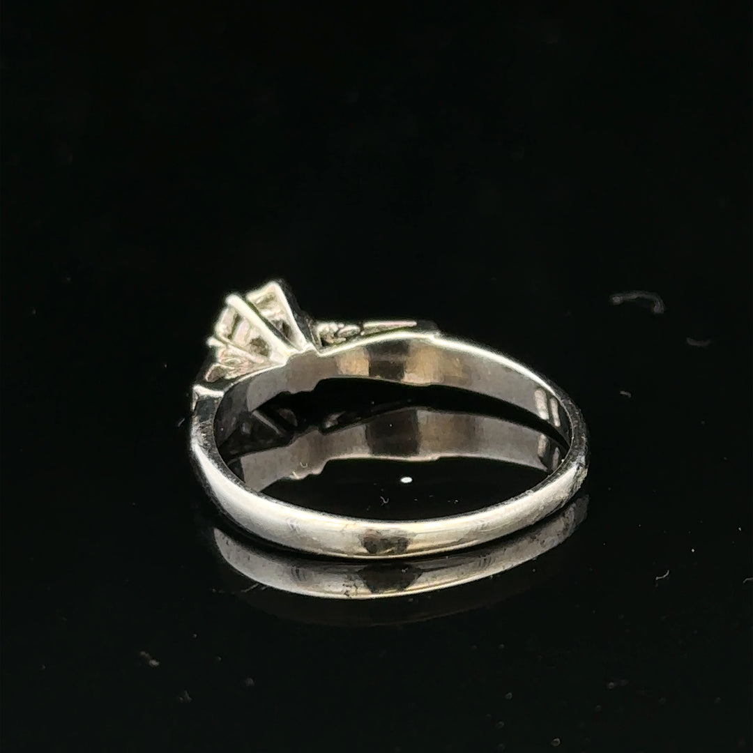 9ct white gold diamond ring with sparkling diamonds, elegant jewelry piece showcasing intricate design and fine craftsmanship.